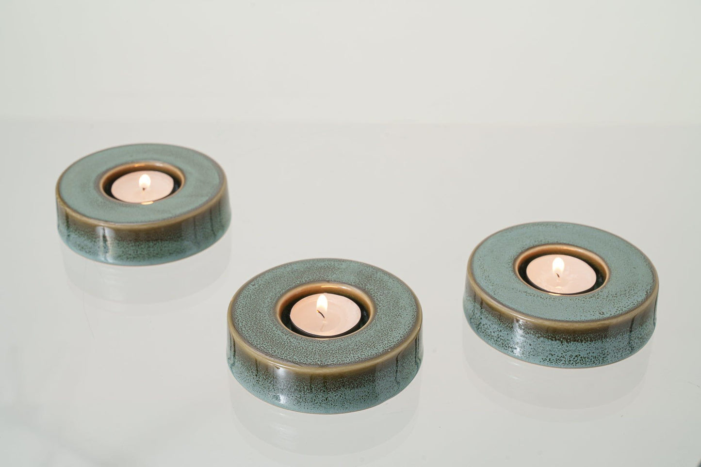 
                  
                    Pulvis Art Urns Candleholder Caleo Handmade Candleholder for Cremation Urns -  Oily Green Melange | Ceramic
                  
                